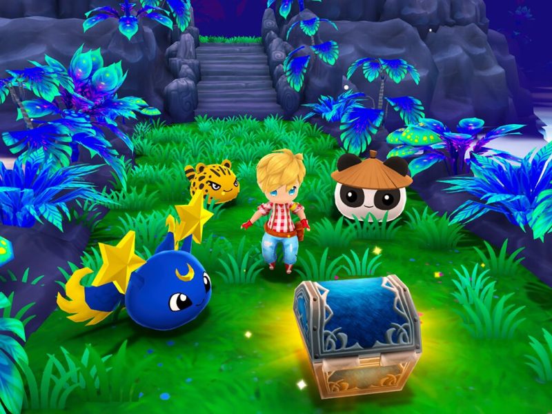 Screenshot aus dem Spiel Ova Magica mit Blob-Kreaturen und Spieler*in vor einer Truhe