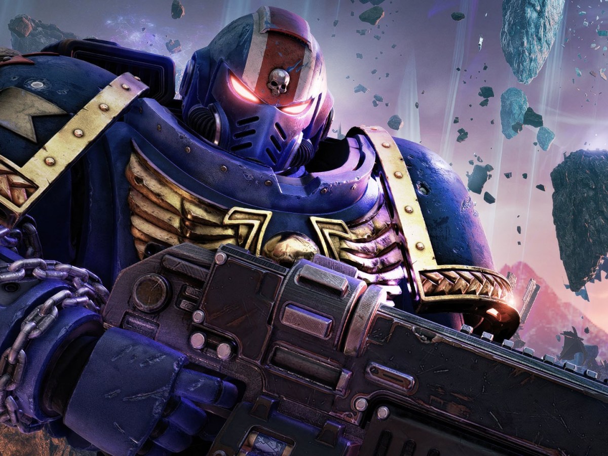 Screenshot aus Warhammer 40.000: Space Marine 2. Zu sehen ist ein grimmig blickender Space Marine 2 mit Gewehr in der Hand.