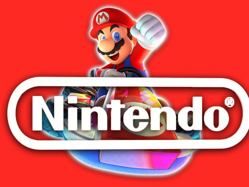 Ein roter Hintergrund mit Mario in einem Kart und dem Nintendo Logo.